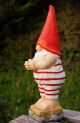 bathing gnome in red hat swimming costume
