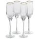 Champagne flute set with gold rim and ribbed texture.